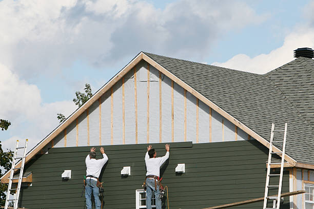 Professional Siding Contractor technician working in Bushwood, MD